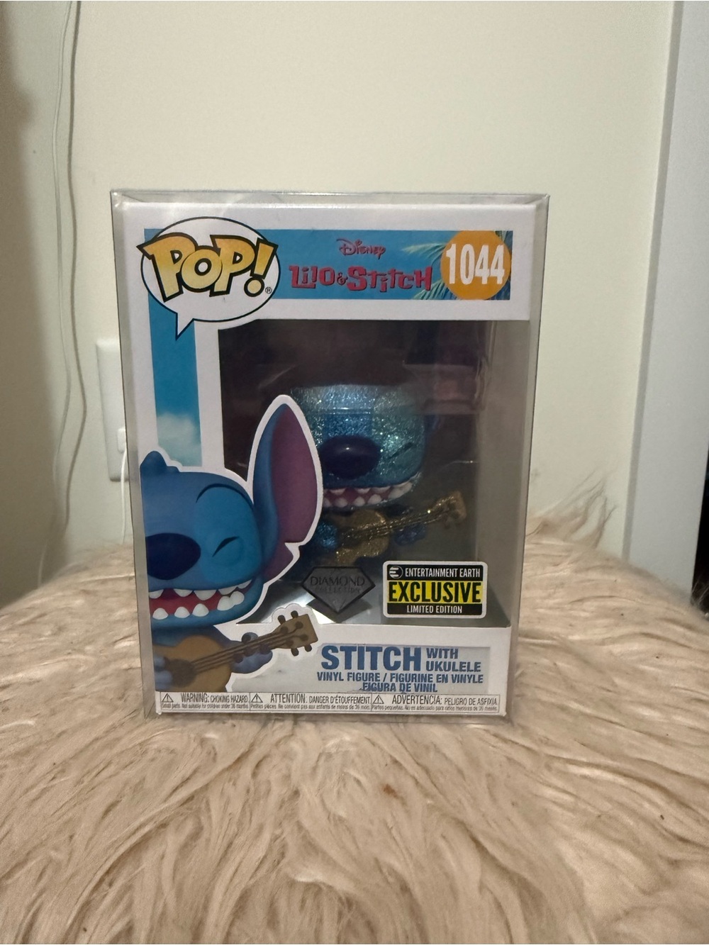 Funko Stitch Vinyl Figure in Blue Glitter with Gold Ukulele